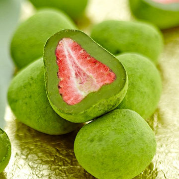 Kobe Frantz - Matcha strawberry truffles with cut strawberry centers